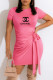 Pink Fashion Sexy Print Letter O Neck One Step Skirt Dresses