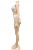 White Fashion Sexy Patchwork Tassel Hollowed Out Sequins Backless Strapless Skinny Romper