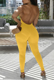 Yellow Sexy Solid Patchwork Backless Halter Regular Jumpsuits