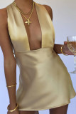 Champagne Sexy Solid Bandage Hollowed Out Backless Asymmetrical Spaghetti Strap One Step Skirt Dresses