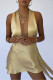 Champagne Sexy Solid Bandage Hollowed Out Backless Asymmetrical Spaghetti Strap One Step Skirt Dresses