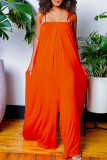 Tangerine Red Casual Solid Bandage Patchwork Spaghetti Strap Loose Jumpsuits
