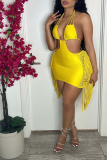 Yellow Sexy Solid Tassel Hollowed Out Halter Pencil Skirt Dresses