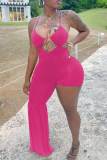 Rose Red Sexy Solid Hollowed Out Patchwork Asymmetrical Spaghetti Strap Straight Jumpsuits