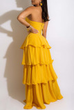 Yellow Sexy Solid Bandage Hollowed Out Backless Halter Strapless Dress