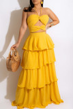 Yellow Sexy Solid Bandage Hollowed Out Backless Halter Strapless Dress