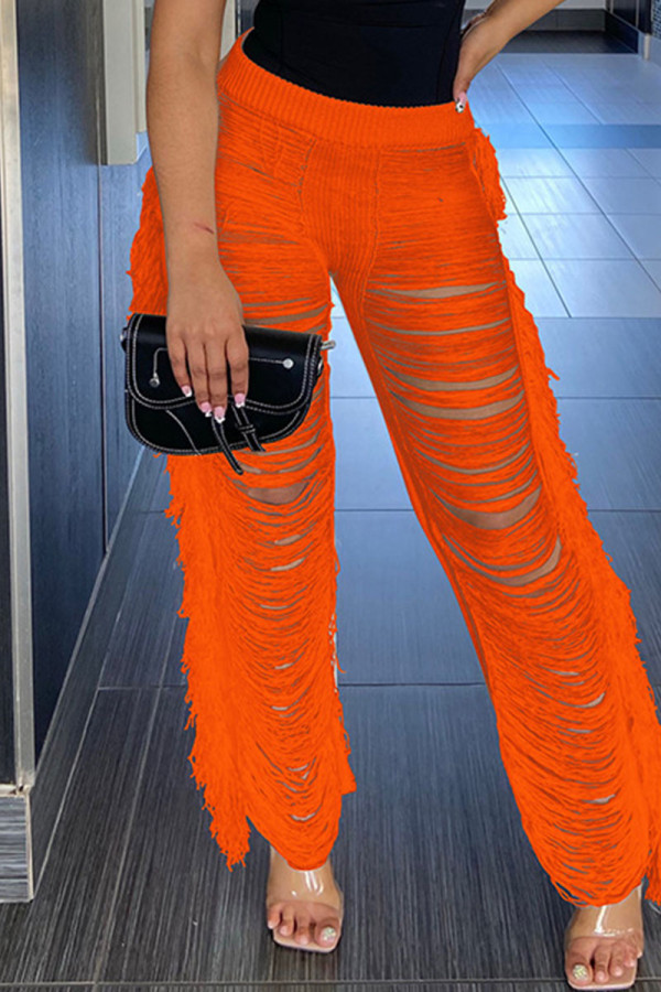 Tangerine Red Sexy Solid Tassel Hollowed Out Patchwork High Waist Straight Solid Color Bottoms