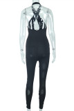 Black Fashion Sexy Solid Hollowed Out Backless Halter Skinny Jumpsuits