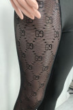 Black Sexy Solid Patchwork Oblique Collar Skinny Jumpsuits