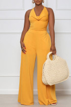 Yellow Sexy Solid Bandage Patchwork Backless Straight Jumpsuits