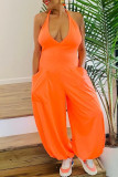 Orange Sexy Casual Solid Bandage Backless Halter Regular Jumpsuits
