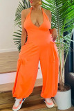 Orange Sexy Casual Solid Bandage Backless Halter Regular Jumpsuits