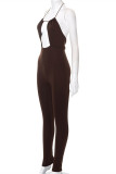 Brown Fashion Sexy Solid Bandage Hollowed Out Backless O Neck Skinny Jumpsuits