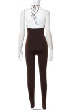 Brown Fashion Sexy Solid Bandage Hollowed Out Backless O Neck Skinny Jumpsuits