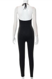 Black Sexy Casual Solid Bandage Hollowed Out Backless Halter Skinny Jumpsuits