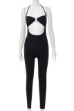 Black Sexy Casual Solid Bandage Hollowed Out Backless Halter Skinny Jumpsuits