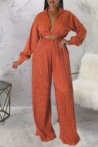 Tangerine Red Sexy Solid Bandage Patchwork Fold Long Sleeve Two Pieces