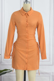 Tangerine Sexy Solid Bandage Hollowed Out Patchwork Buckle Turndown Collar Shirt Dress Dresses
