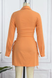 Tangerine Sexy Solid Bandage Hollowed Out Patchwork Buckle Turndown Collar Shirt Dress Dresses