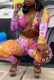Orange Sexy Casual Print Hollowed Out V Neck Skinny Jumpsuits