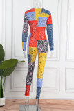 Orange Sexy Casual Print Hollowed Out V Neck Skinny Jumpsuits