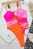 Rose Red Sexy Patchwork Hollowed Out Frenulum Backless Contrast Swimwears (With Paddings)