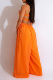 Orange Sexy Solid Patchwork Backless Halter Straight Jumpsuits