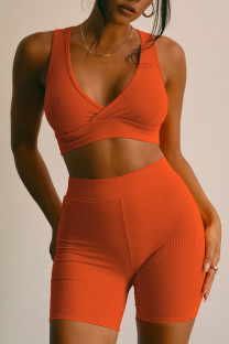 Tangerine Red Sexy Sportswear Solid Patchwork V Neck Two Pieces