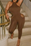 Brown Sexy Solid Hollowed Out Backless Halter Skinny Jumpsuits