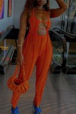 Orange Sexy Solid Hollowed Out Backless Halter Skinny Jumpsuits