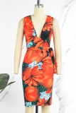 Orange Sexy Casual Celebrities Floral Frenulum V Neck One Step Skirt Dresses(With Belt)