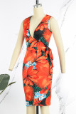 Orange Sexy Casual Celebrities Floral Frenulum V Neck One Step Skirt Dresses(With Belt)