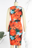 Orange Sexy Casual Celebrities Floral Frenulum V Neck One Step Skirt Dresses(With Belt)
