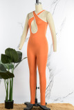 Orange Sexy Casual Solid Hollowed Out Backless V Neck Skinny Jumpsuits