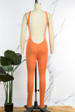 Orange Sexy Casual Solid Hollowed Out Backless V Neck Skinny Jumpsuits