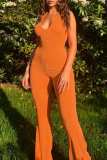 Orange Sexy Solid Bandage Backless Halter Skinny Jumpsuits