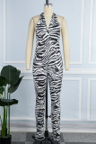 Rose Red Sexy Casual Print Bandage Backless Halter Skinny Jumpsuits