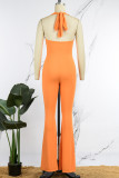 Orange Sexy Solid Bandage Backless Halter Skinny Jumpsuits