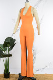 Orange Sexy Solid Bandage Backless Halter Skinny Jumpsuits