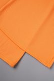 Orange Sexy Solid Bandage Backless Halter Skinny Jumpsuits