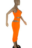 Tangerine Sexy Solid Hollowed Out Patchwork Spaghetti Strap Pencil Skirt Dresses