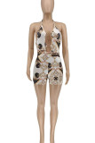 Cream White Sexy Print Hollowed Out Patchwork Metal Accessories Decoration Backless Halter Skinny Rompers
