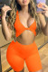 Tangerine Red Sexy Solid Hollowed Out Patchwork Knotted V Neck Rompers