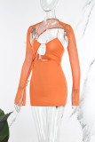 Orange Sexy Solid Hollowed Out V Neck Long Sleeve Dresses