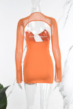 Orange Sexy Solid Hollowed Out V Neck Long Sleeve Dresses
