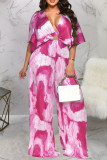 Rose Red Sexy Print Hollowed Out Patchwork Fold V Neck Loose Jumpsuits