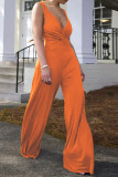 Tangerine Red Sexy Solid Patchwork Fold V Neck Loose Jumpsuits