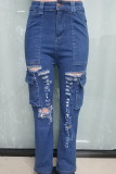 The cowboy blue Street Solid Ripped Patchwork Pocket Buttons Zipper High Waist Straight Denim Jeans