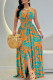 Orange Elegant Print Patchwork Backless Fold Spaghetti Strap Sling Dresses