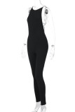 Black Sexy Casual Hot Solid Color Metal Accessories Trim Backless O Neck Skinny Jumpsuits